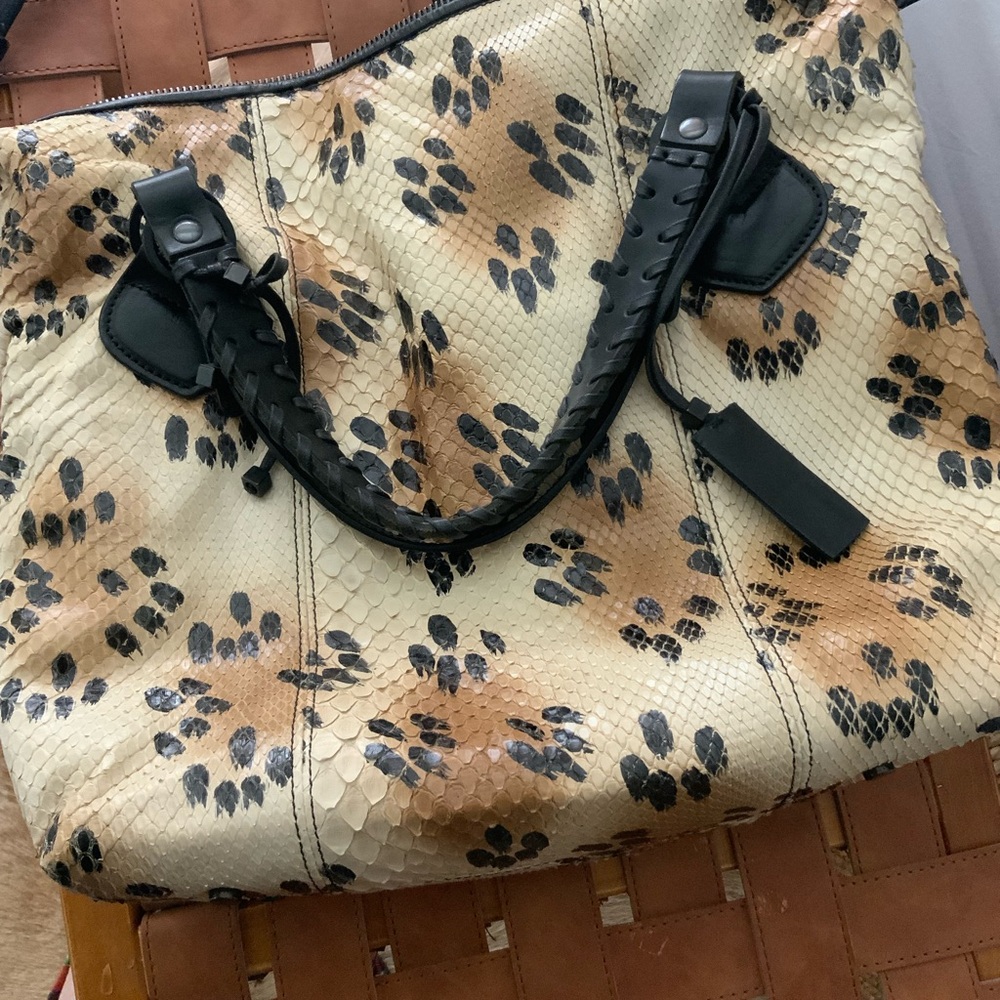 Pauric Sweeney Stylish Black and cream python 
Italian made bag